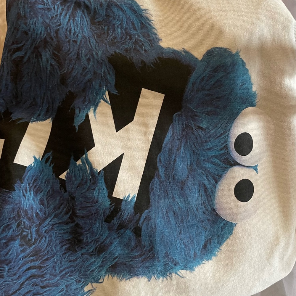 Kith for Sesame Street Cookie Monster Tee size small in hand